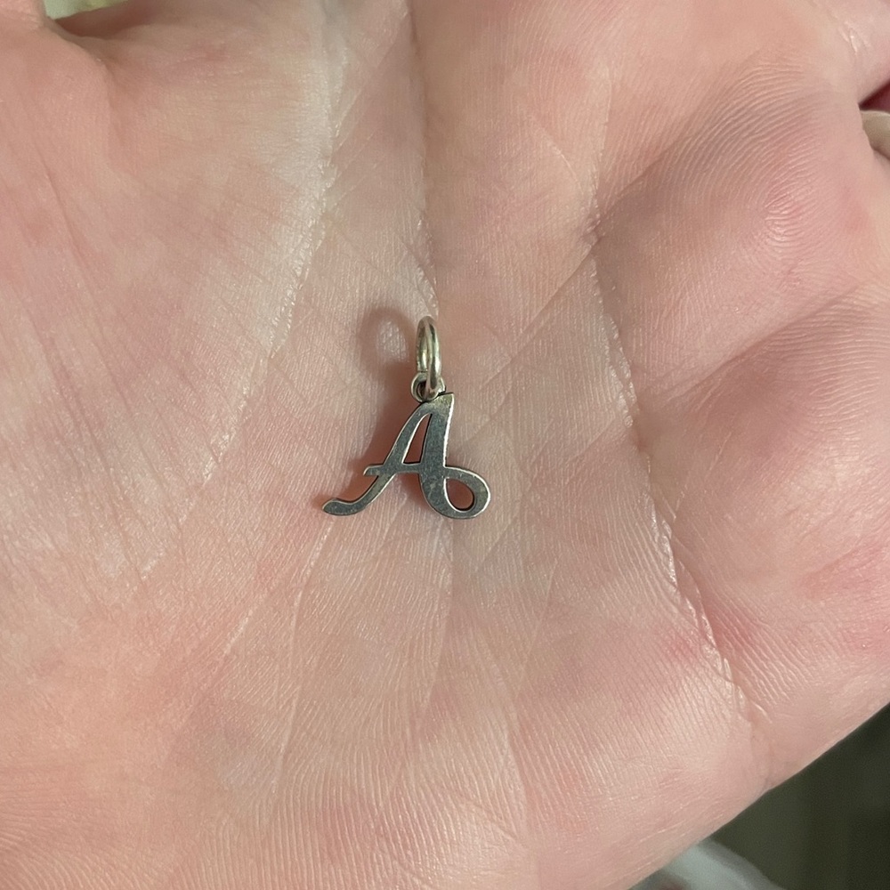 A initial charm
